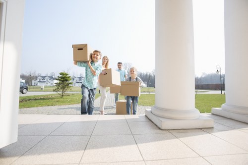 Student moving furniture and supplies into storage in Debeauvoirtown