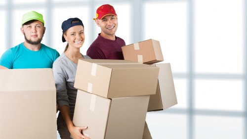 Storage unit space organized with boxes and furniture