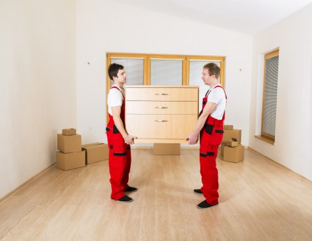 Packed boxes and furniture prepared for temporary storage